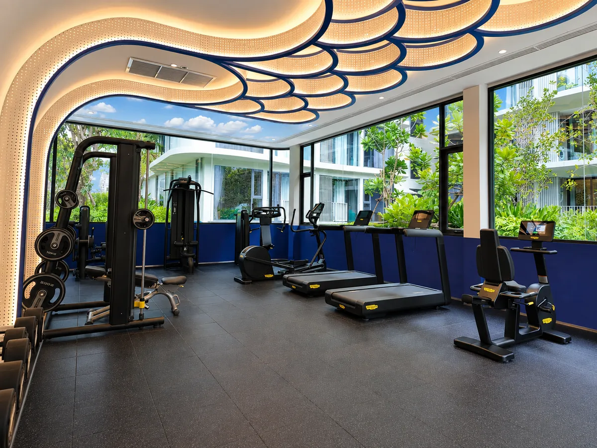 Fitness centre with garden views at Bellevue Beachfront